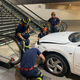 Image for article titled Car Thief Drives Mazda6 Down Bus Station Staircase in Madrid